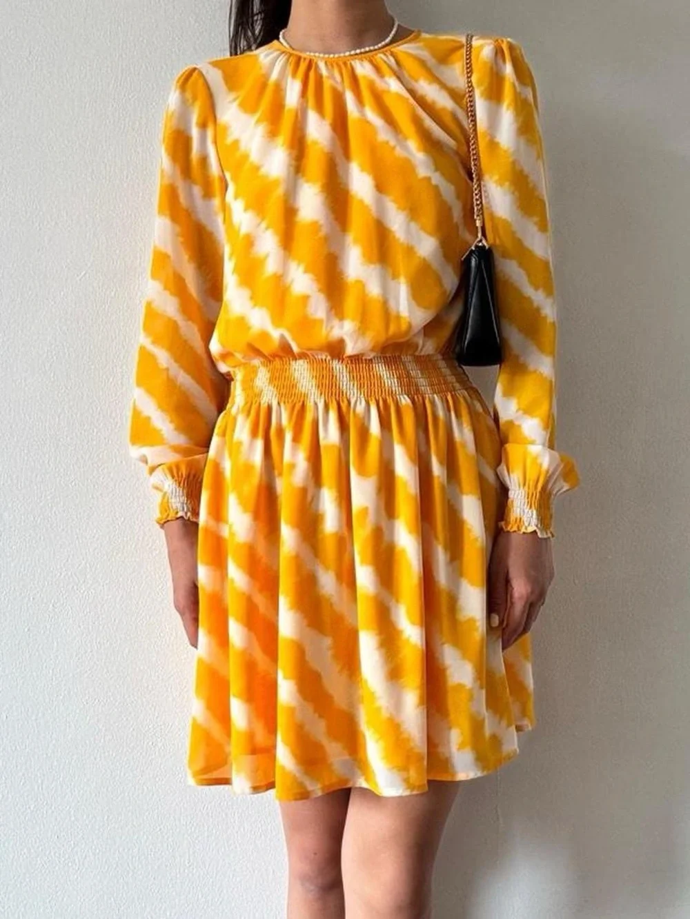 Michael Kors yellow and white tie-dye mini long sleeve dress with elastic waist
